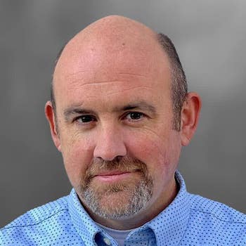 GREG AUMAN
