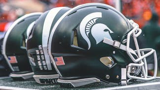 Next Story Image: Michigan State president advises board to hire Georgia Tech AD J Batt